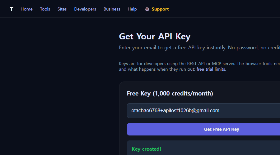 The API key page showing Free Key (1,000 credits/month) after a key was just created